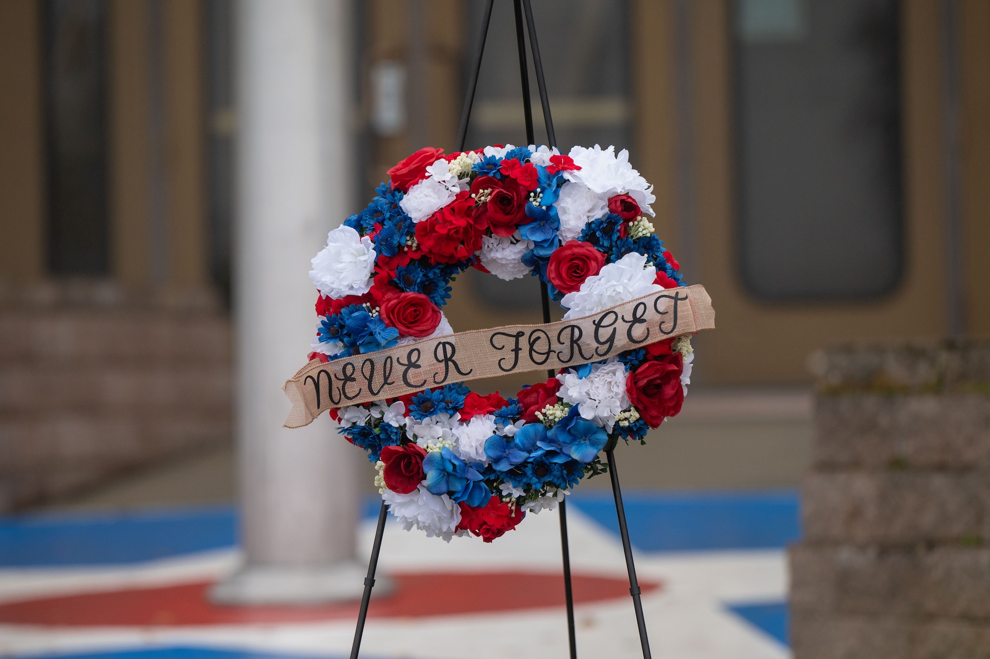 A wreath is presented during the 24th annual 9/11 Remembrance Ceremony at Eielson Air Force Base, Alaska, Sept. 11, 2025.
