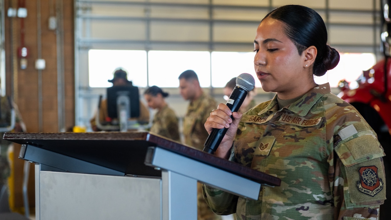 An Airman delivers invocation