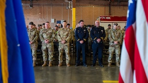 Attendees observing moment of silence