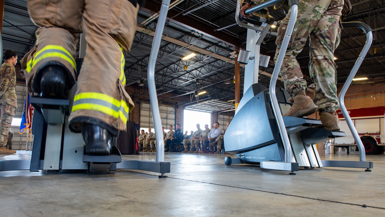 Airmen walking on optical machine
