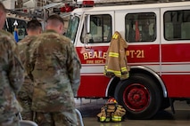 U.S. Airmen listen as a guest speaker shares remarks during a 9/11 Remembrance Event at Beale Air Force Base, California, Sept. 11, 2025. Beale hosted the event to honor the victims of the attacks and pay tribute to those who made the ultimate sacrifice. (U.S. Air Force photo by Airman 1st Class Chelsea Arana)