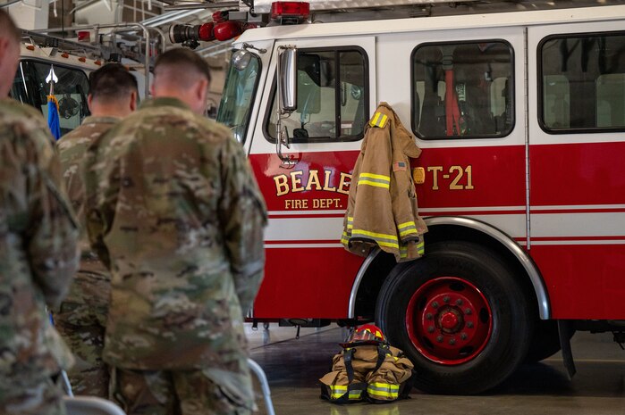 U.S. Airmen listen as a guest speaker shares remarks during a 9/11 Remembrance Event at Beale Air Force Base, California, Sept. 11, 2025. Beale hosted the event to honor the victims of the attacks and pay tribute to those who made the ultimate sacrifice. (U.S. Air Force photo by Airman 1st Class Chelsea Arana)