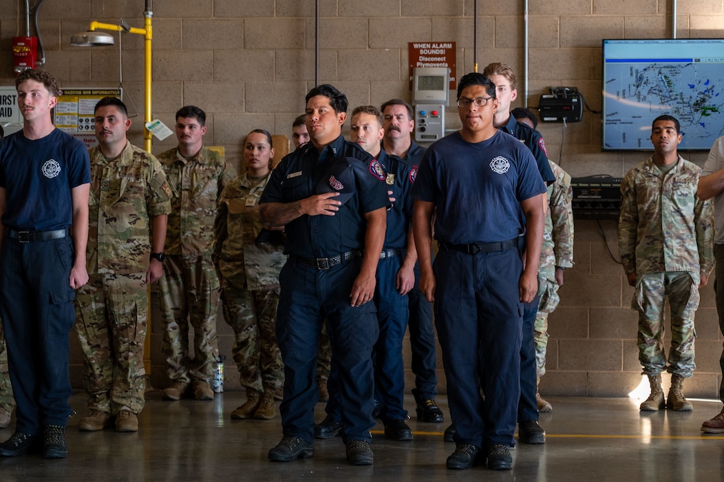 U.S. Airmen listen as a guest speaker shares remarks during a 9/11 Remembrance Event at Beale Air Force Base, California, Sept. 11, 2025. Beale hosted the event to honor the victims of the attacks and pay tribute to those who made the ultimate sacrifice. (U.S. Air Force photo by Airman 1st Class Chelsea Arana)