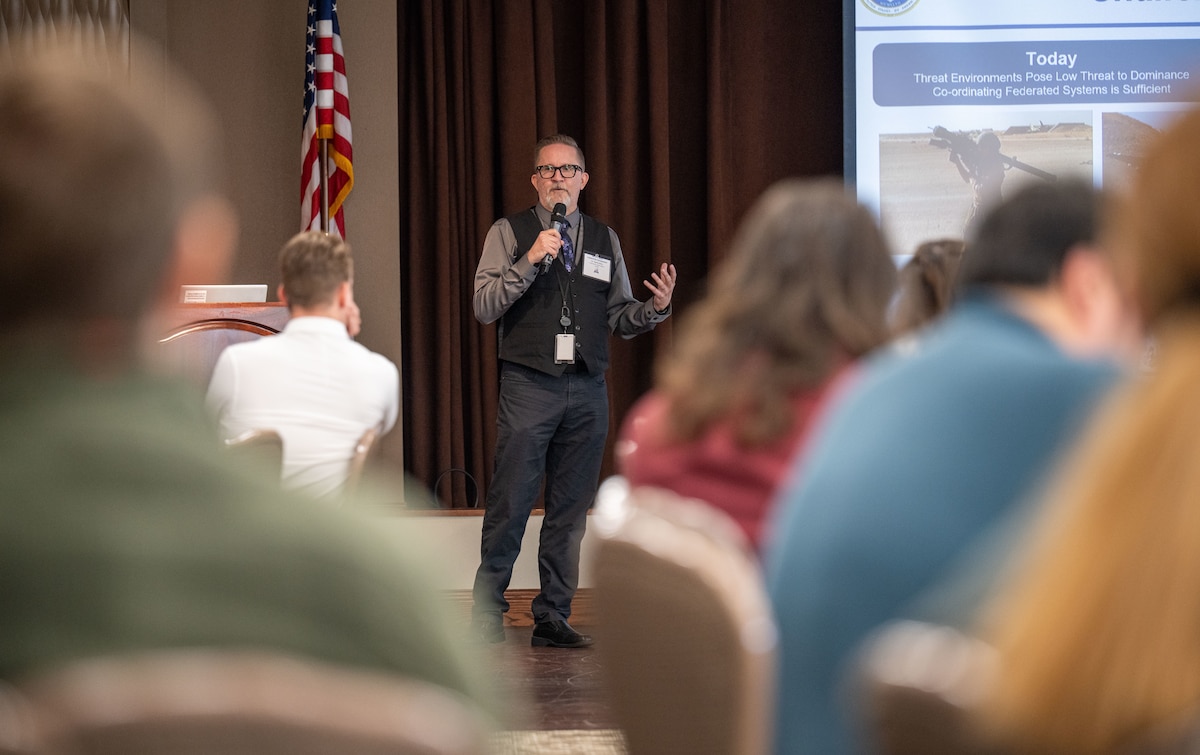 Dr. Patrick Berry gives a presentation on leadership during the Wright-Patt Junior Force Leadership Symposium on Sept. 4, 2025, at Wright-Patterson Air Force Base, Ohio. The council focuses on developing Air Force leaders through professional development, leadership, service, and networking opportunities. (U.S. Air Force photo by Jack Gardner)