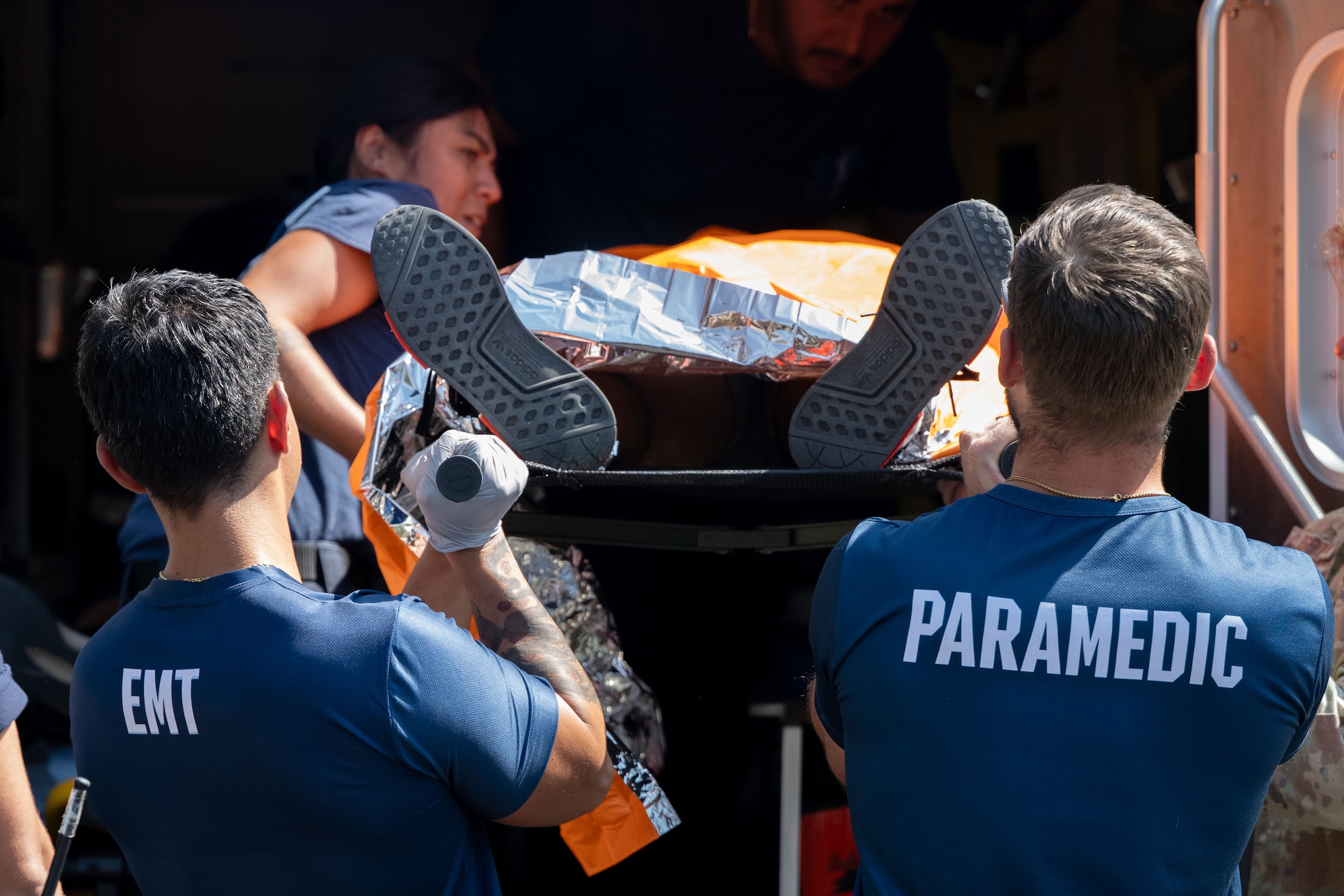 39th Medical Group paramedics load a casualty into an ambulance during Exercise Titan Shield 25-09 at Incirlik Air Base, Türkiye, Sept. 10, 2025. The mass casualty portion of the exercise tested Airmen’s ability to deliver fast, coordinated care under pressure, demonstrating their readiness to support the mission during crisis conditions. (U.S. Air Force photo by Senior Airman Greydon Furstenau)