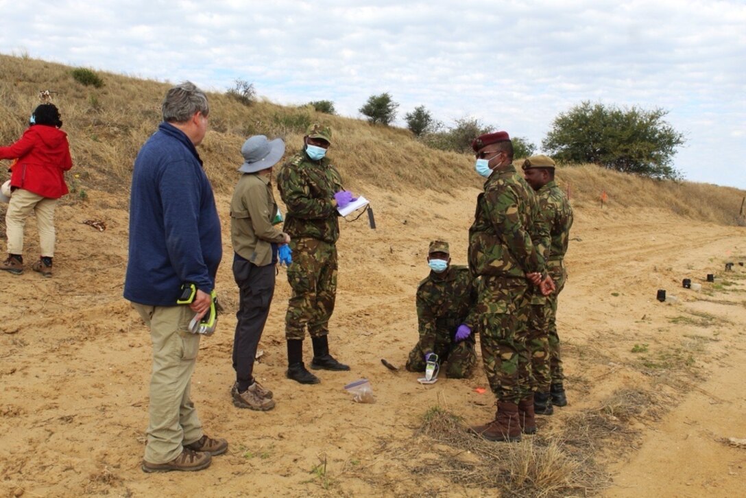 Drs. Yoko Slowey and Mark Chappell, with ERDC's Environmental Lab, collect data at one of the Botswana Defense Force (BDF) shooting ranges.