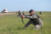 A Romanian marine posts security in a training exercise during exercise Sea Breeze 25-1 in Smardan Range, Romania, June 12, 2025.