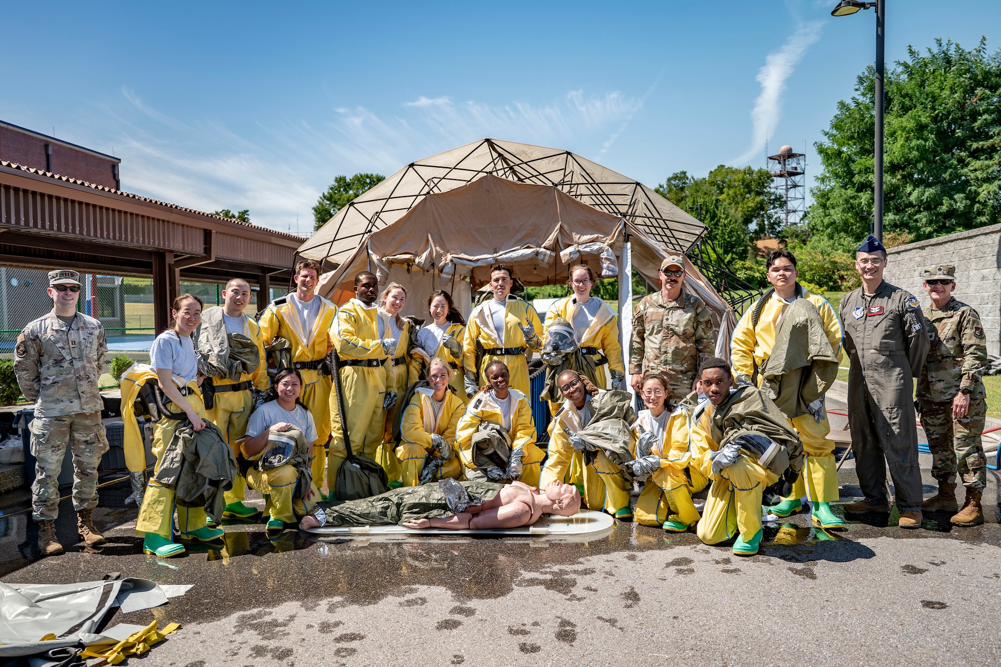 U.S. Air Force Airmen assigned to the 51st Medical Group pose for a photo after completing a chemical decontamination exercise at Osan Air Base, Republic of Korea, Sept. 11, 2025.