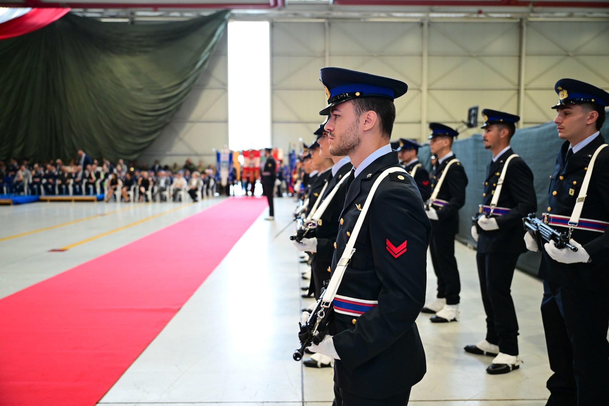 Members of the Italian Air Force honor guard stand in formation.
