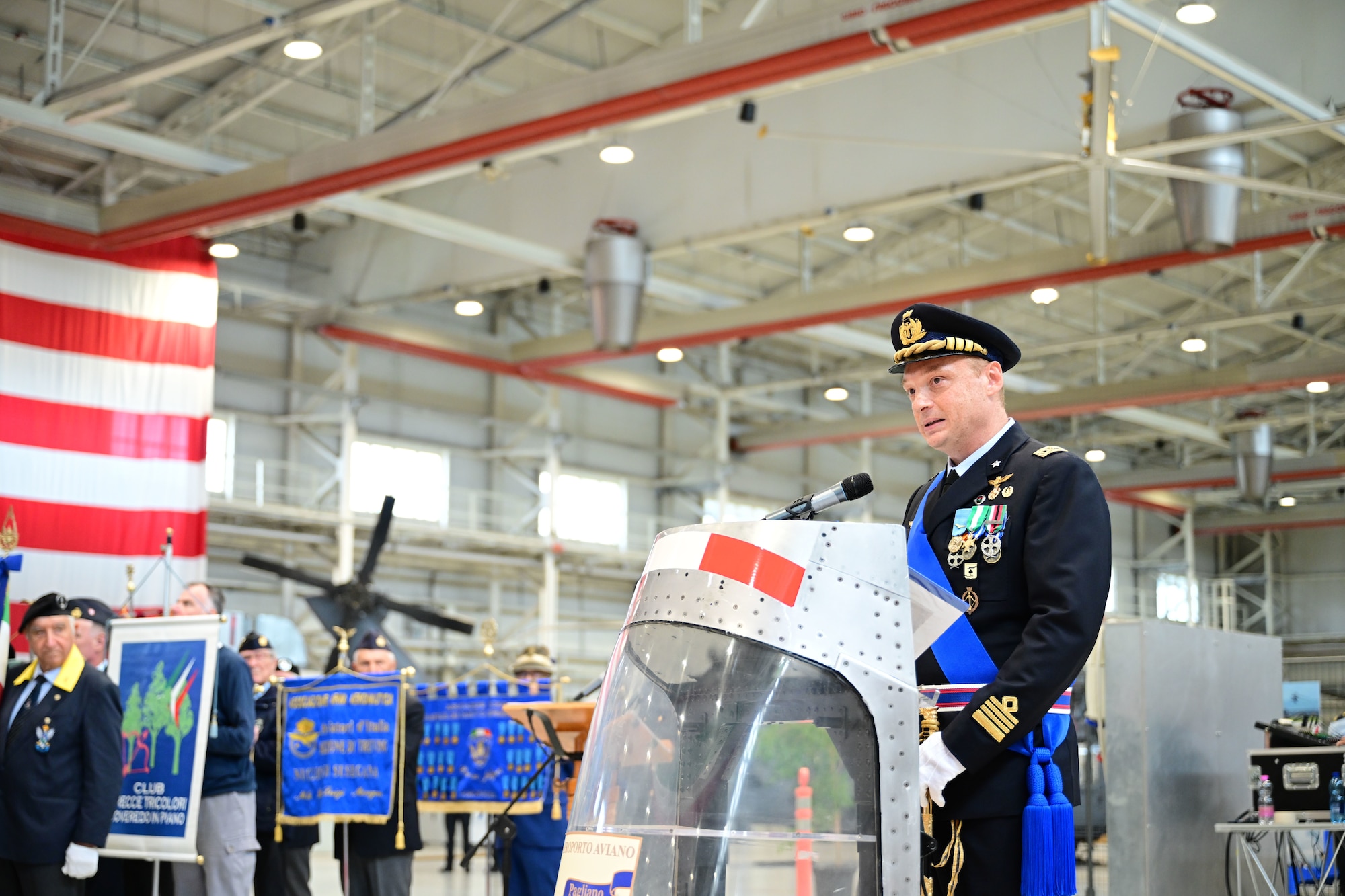 The new Italian Air Force Colonel gives remarks.
