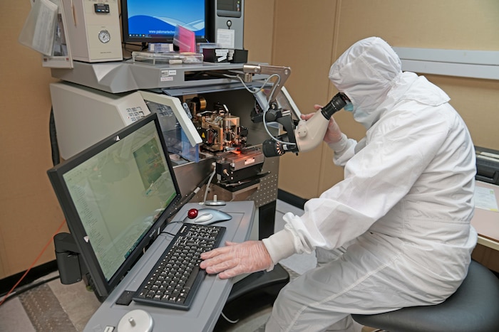 men working on electronics