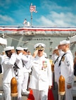 NAVAL STATION MAYPORT, Fla. (Sept. 10, 2025) - Cmdr. Matthew D. Arndt, outgoing commanding officer, USS Indianapolis (LCS 17)), salutes as he departs a change of command ceremony where he was relieved by Cmdr. Timothy J. Orth as the ship’s commanding officer at Naval Station Mayport, Sept. 10, 2025. USS Indianapolis (LCS 17) is a Freedom-variant littoral combat ship designed for speed, agility, and mission flexibility in near-shore and open-ocean operations.(U.S. Navy photo by Mass Communication Specialist 1st Class Brandon J. Vinson)