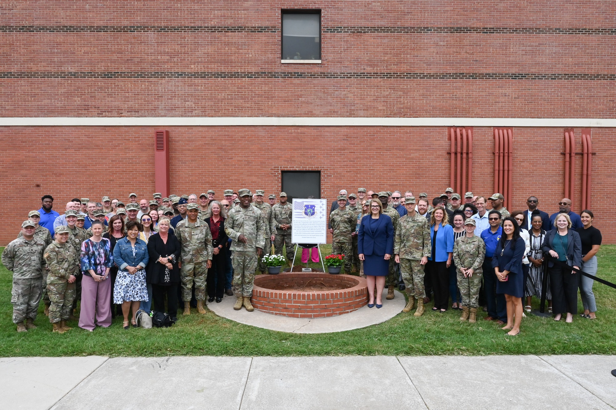 Military leadership burying a time capsule.