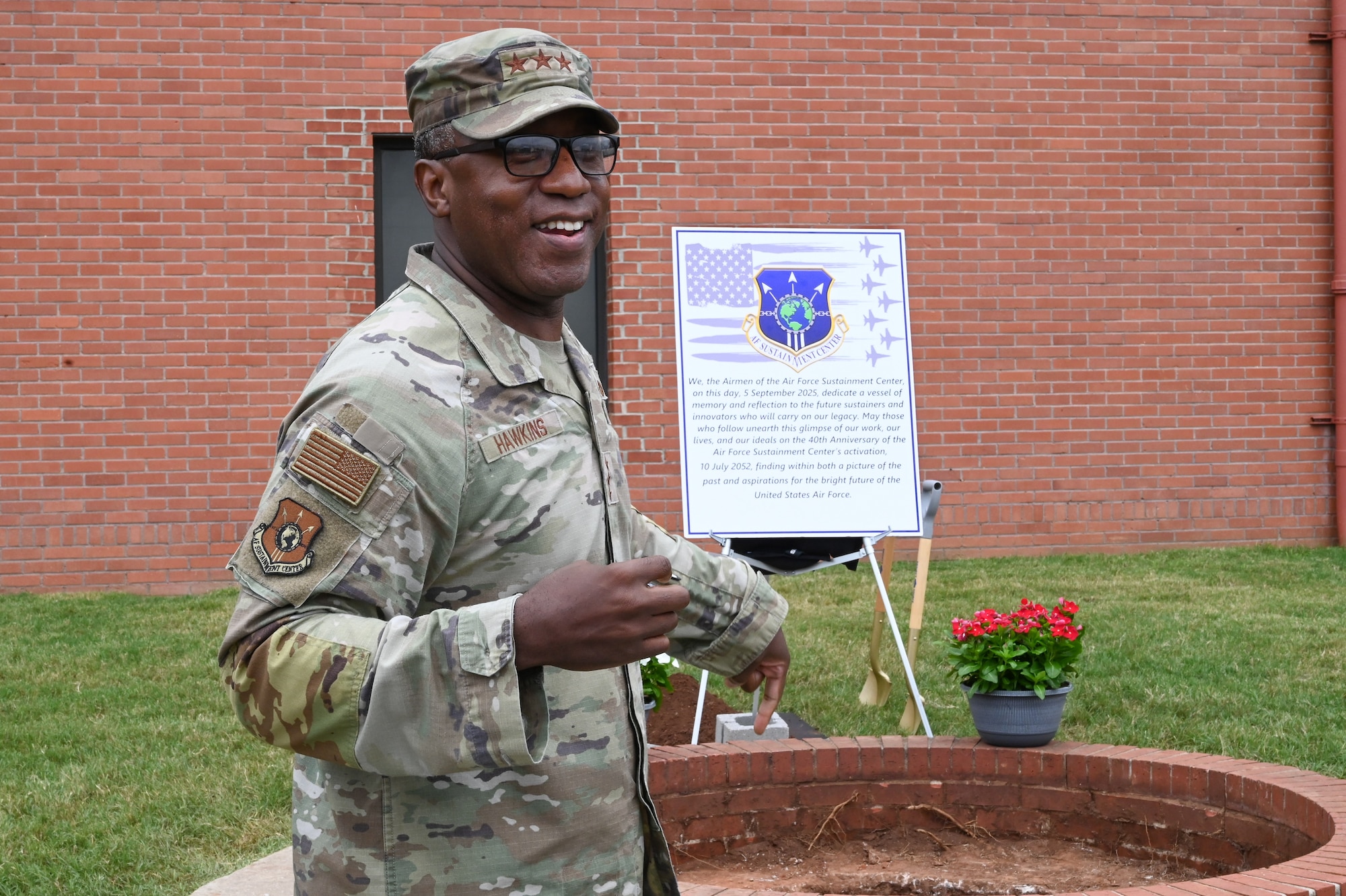 Military leadership burying a time capsule.