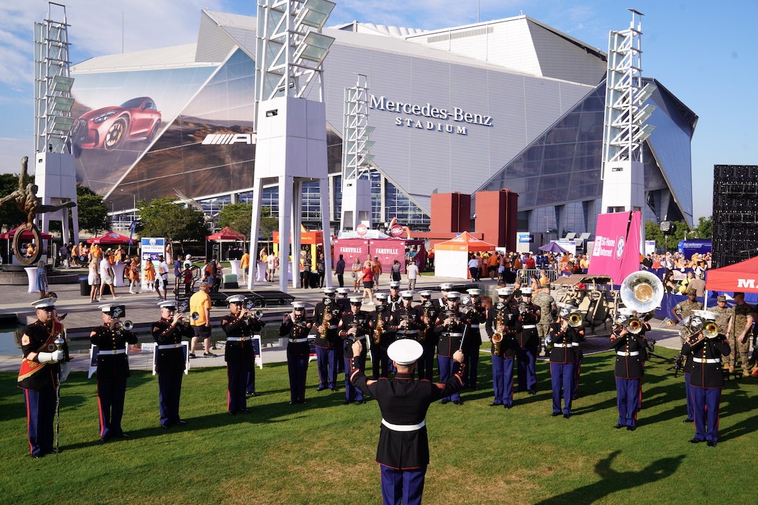 U.S. Marines with the 2nd Marine Aircraft Wing Band, assigned to Special Purpose Marine Air-Ground Task Force-250 perform at the static display during Marine Week Atlanta, Aug. 30, 2025. Marines stationed across the globe commemorate the 250th anniversary of the Marine Corps, honoring a distinguished legacy of service, sacrifice, and unwavering fidelity to both the nation and the Corps. (U.S. Marine Corps photo by Staff Sgt. Matthew Booth)