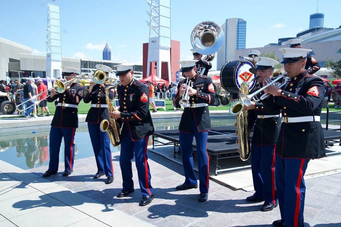 U.S. Marines with the 2nd Marine Aircraft Wing Band, brass band, assigned to Special Purpose Marine Air-Ground Task Force-250 perform at the static display during Marine Week Atlanta, Aug. 31, 2025. Marines stationed across the globe commemorate the 250th anniversary of the Marine Corps, honoring a distinguished legacy of service, sacrifice, and unwavering fidelity to both the nation and the Corps. (U.S. Marine Corps photo by Staff Sgt. Matthew Booth)