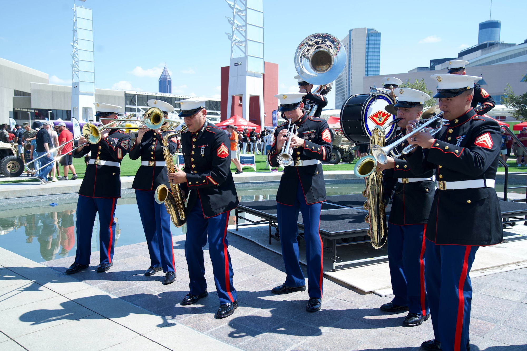 U.S. Marines with the 2nd Marine Aircraft Wing Band, brass band, assigned to Special Purpose Marine Air-Ground Task Force-250 perform at the static display during Marine Week Atlanta, Aug. 31, 2025. Marines stationed across the globe commemorate the 250th anniversary of the Marine Corps, honoring a distinguished legacy of service, sacrifice, and unwavering fidelity to both the nation and the Corps. (U.S. Marine Corps photo by Staff Sgt. Matthew Booth)
