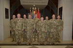 Indiana National Guard leadership poses with front from left, Chief Warrant Officer 4 Brett Milton, Chief Warrant Officer 3 Craig Adams, Sgt. 1st Class Adam Kabella and Sgt. Dalton McCollum, are recognized for their heroism during a ceremony at Stout Field in Indianapolis, Friday, Sept. 12, 2025. The soldiers received their awards for helping to save lives during Kentucky floods in February.