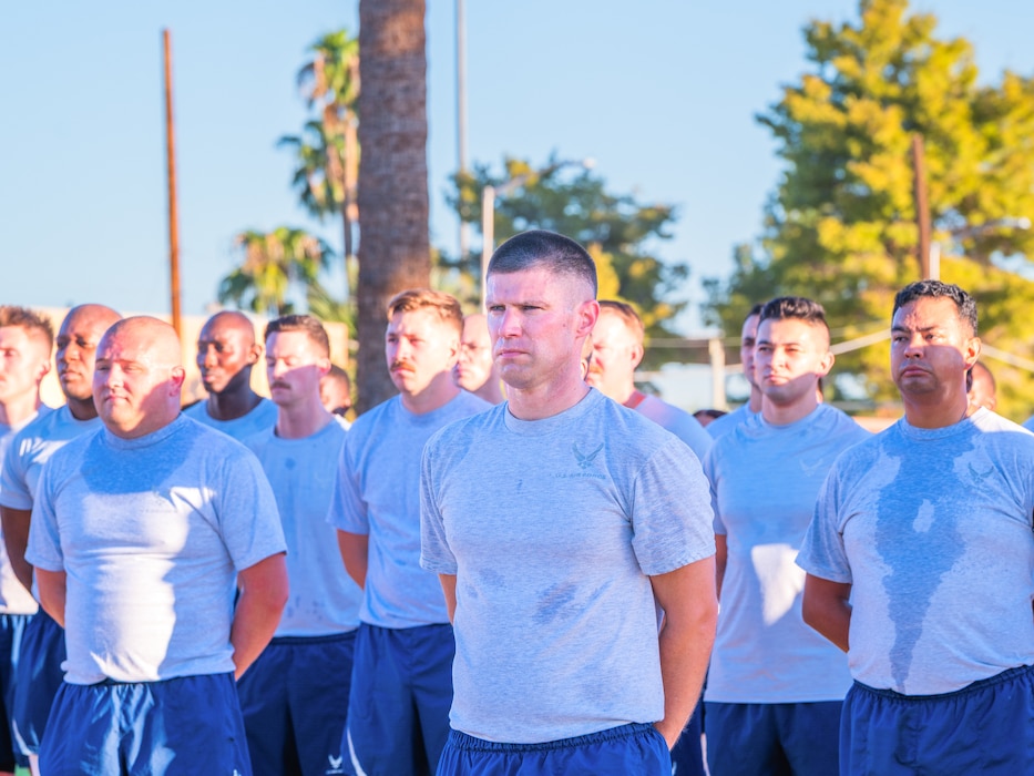 U.S. Air Force Lt. Col. Branden Delong (center), 56th Civil Engineer Squadron commander, and Airmen assigned to the 56th CES stand in formation during a 9/11 memorial event, Sept. 11, 2025, at Luke Air Force Base, Arizona.