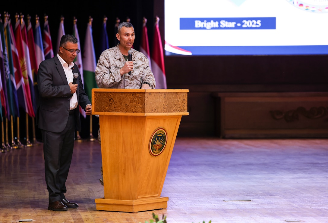U.S. Marine Corps Brig. Gen. Stephen Lightfoot, right, the commanding general of Task Force 51/5th Marine Expeditionary Brigade, gives opening remarks for the command post exercise during BRIGHT STAR 25 at Mohamed Naguib Military Base (MNMB), Egypt, Sept. 1, 2025. Exercise BRIGHT STAR 25 is a multilateral U.S. Central Command (USCENTCOM) command-post exercise, field training exercise and senior leader seminar, held in the Arab Republic of Egypt along with other partner nations. Participation strengthens military-to-military relationships between U.S. forces and our Egyptian partners in the USCENTCOM area of responsibility, as well as other participating nations. The exercise enhances regional security and stability by responding to modern-day security scenarios. (U.S. Marine Corps photo by Sgt. Angela Wilcox)