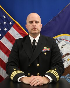 Cmdr. RYAN J. SISLER