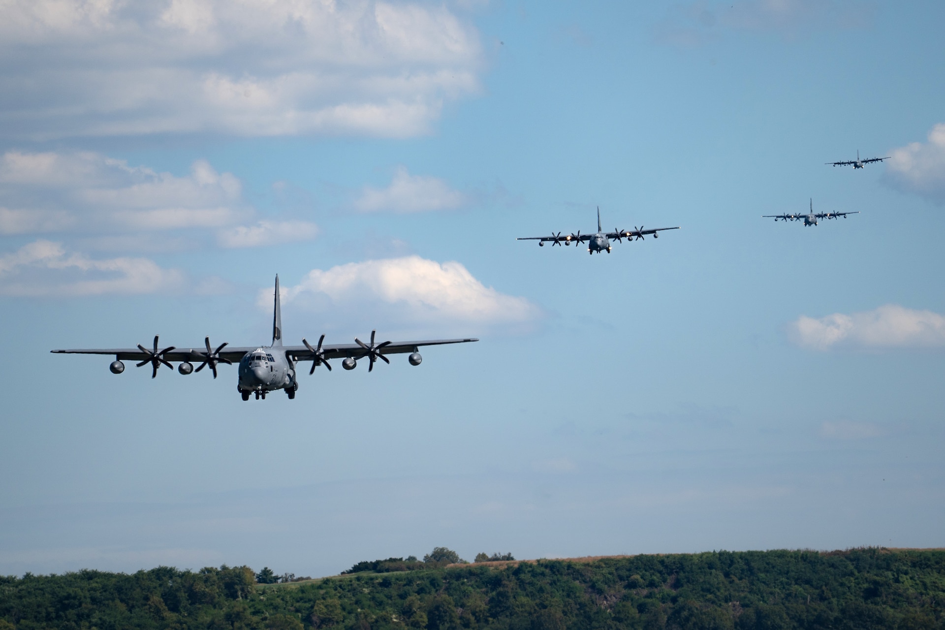 U.S. Airmen with the 193rd Special Operations Wing, Pennsylvania National Guard fly MC-130J Commandos II during a formation flight from Harrisburg International Airport at Middletown, Pennsylvania, Sept. 11, 2025. Airmen with the wing flew in multiple MC-130J Commando II aircraft as a tribute to our nation and the lives lost in the Sept. 11 terrorist attacks. (U.S. Army National Guard photo by Sgt. Kayden Bedwell)