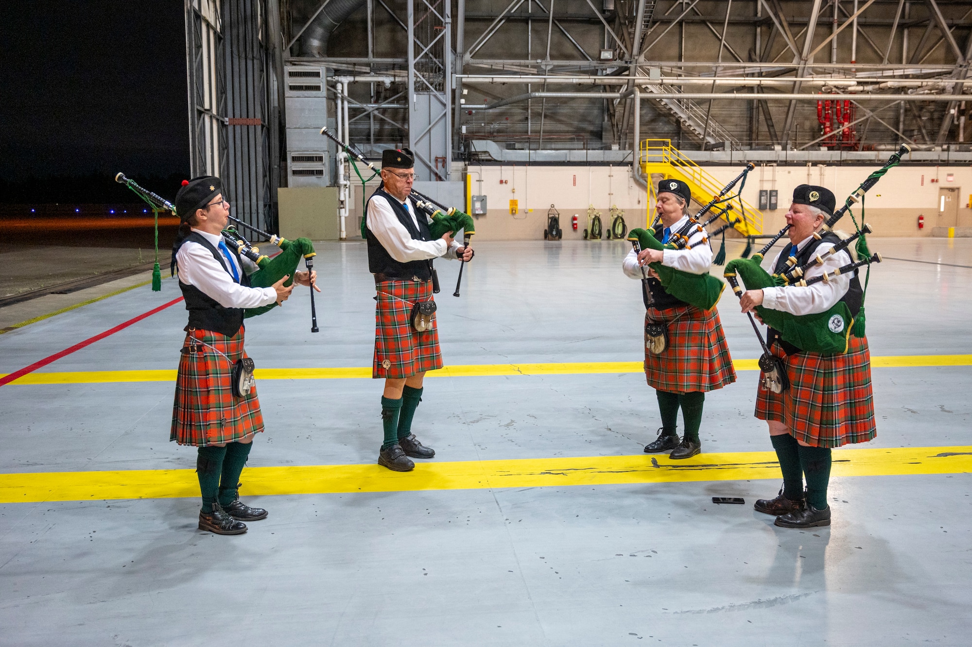 Members of the Tacoma Scots Pipe Band perform during the 7th Expeditionary Airlift Squadron’s redeployment to Joint Base Lewis-McChord, Washington, Sept. 7, 2025.