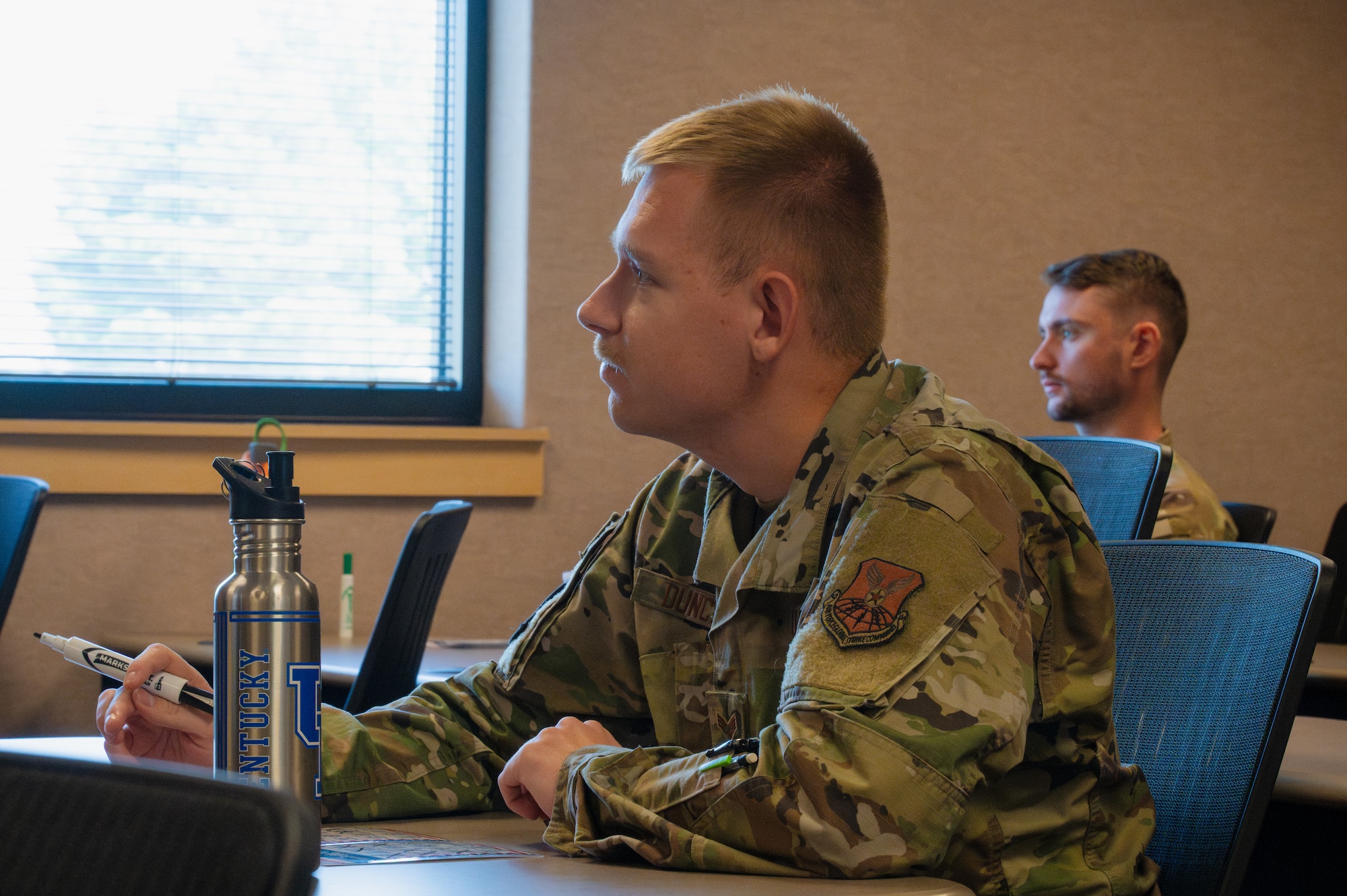 U.S. Airmen gather for a noncommissioned officer course at Whiteman Air Force Base, Missouri, Sept. 5, 2025. The NCO program is designed to provide Airmen information and applicable skills to operate within a leadership role as upcoming Staff Sergeants.