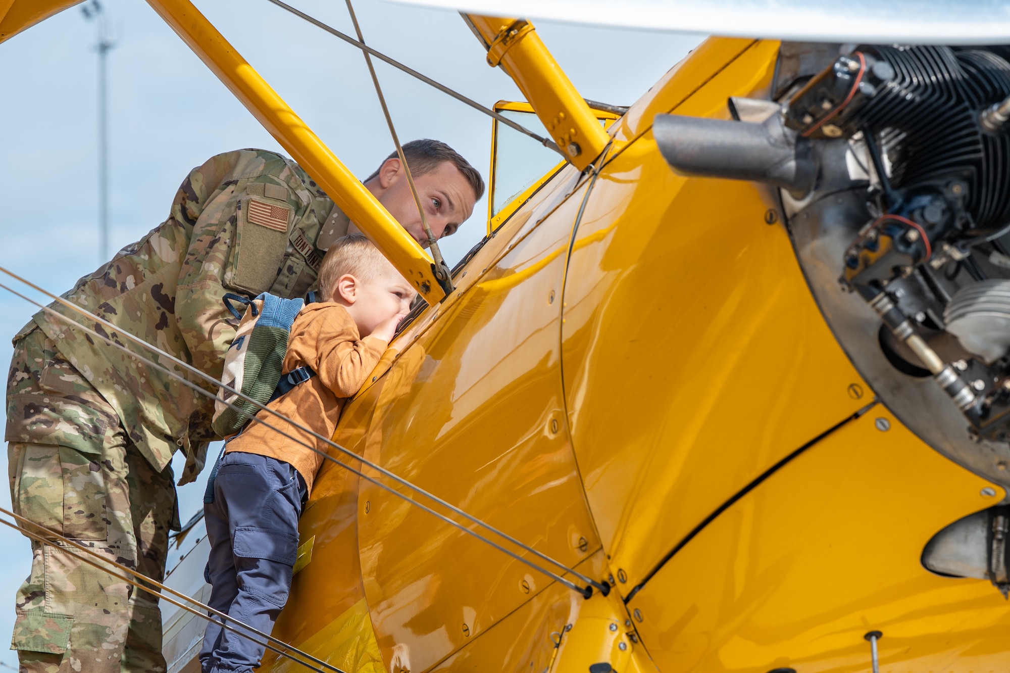 Photo of More than 6,000 visitors exploring the Vermont National Guard Open House at the Vermont Air National Guard Base, South Burlington, Vermont, Sept 7, 2005. This event allows guests to meet National Guardsmen, learn more about military and civilian aviation, watch multiple demonstrations, and enjoy walking through the STEM and job fairs hosted by our community partners