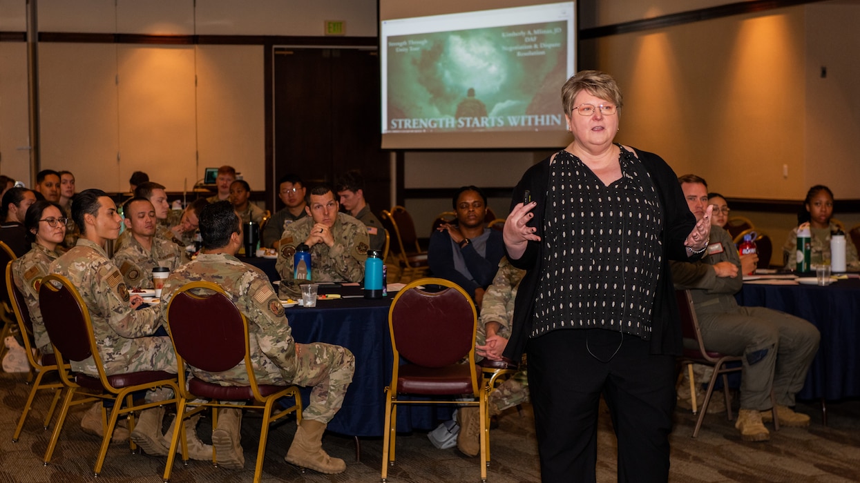 Facilitator speaks to Airmen