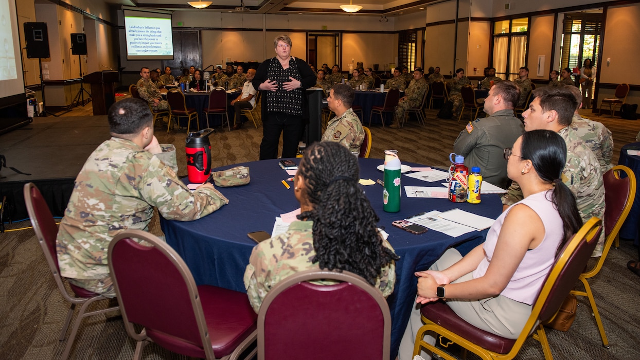 Facilitator speaks to Airmen