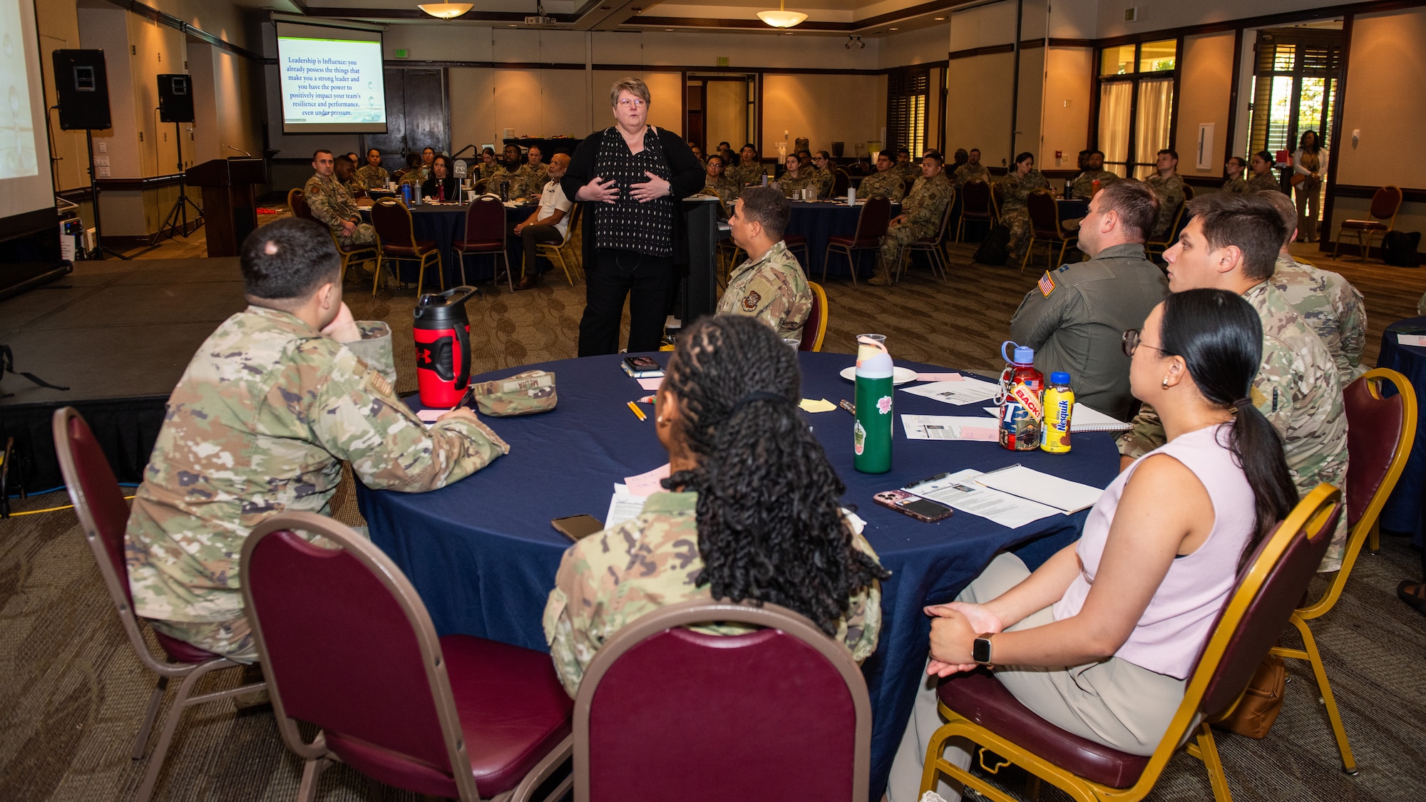 Facilitator speaks to Airmen