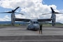 A U.S. Marine with Marine Medium Tiltrotor Squadron (VMM) 262, Marine Aircraft Group 36, 1st Marine Aircraft Wing guides an MV-22B Osprey after landing at Japan Maritime Self-Defense Force Kanoya Air Base, Kagoshima, Japan, Sept. 8, 2025.
