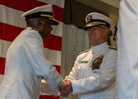 NAVAL STATION NORFOLK (Sept. 12, 2025) – Rear Adm. Stephen Barnett relieves Rear Adm. Carl Lahti as Commander of Navy Region Mid-Atlantic (CNRMA), during a change of command and retirement ceremony held at Vista Point onboard Naval Station Norfolk, Sept. 12. CNRMA, now commanded by Rear Adm. Stephen Barnett, is the regional coordinator for all shore-based naval personnel and shore activities in the Mid-Atlantic region, which encompasses 20 states, 13 installations, and numerous Navy reserve centers from Maine to Virginia and as far west as Illinois. (U.S. Navy photo by Mass Communication Specialist 1st Class Kirk T. Putnam)