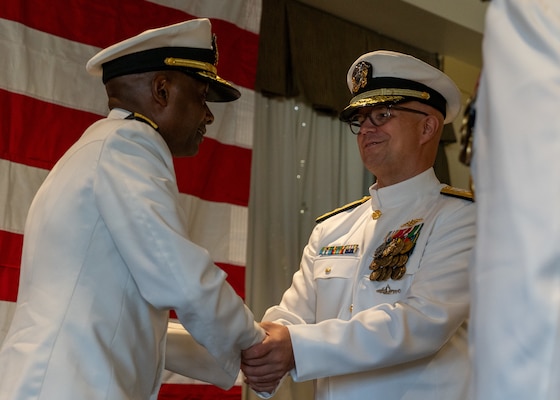 NAVAL STATION NORFOLK (Sept. 12, 2025) – Rear Adm. Stephen Barnett relieves Rear Adm. Carl Lahti as Commander of Navy Region Mid-Atlantic (CNRMA), during a change of command and retirement ceremony held at Vista Point onboard Naval Station Norfolk, Sept. 12. CNRMA, now commanded by Rear Adm. Stephen Barnett, is the regional coordinator for all shore-based naval personnel and shore activities in the Mid-Atlantic region, which encompasses 20 states, 13 installations, and numerous Navy reserve centers from Maine to Virginia and as far west as Illinois. (U.S. Navy photo by Mass Communication Specialist 1st Class Kirk T. Putnam)