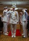 NAVAL STATION NORFOLK (Sept. 12, 2025) – Deputy Chief of Naval Operations for Information Warfare, N2N6 / Director of Naval Intelligence, Vice Adm. Karl Thomas, passes through sideboys during a change of command and retirement ceremony held at Vista Point onboard Naval Station Norfolk, Sept. 12. CNRMA, now commanded by Rear Adm. Stephen Barnett, is the regional coordinator for all shore-based naval personnel and shore activities in the Mid-Atlantic region, which encompasses 20 states, 13 installations, and numerous Navy reserve centers from Maine to Virginia and as far west as Illinois. (U.S. Navy photo by Mass Communication Specialist 1st Class Kirk T. Putnam)