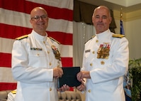 NAVAL STATION NORFOLK (Sept. 12, 2025) – Rear Adm. Carl Lahti poses for a photo with Commander, Navy Installations Command, Vice Adm. Scott Gray, during a change of command and retirement ceremony held at Vista Point onboard Naval Station Norfolk, Sept. 12. CNRMA, now commanded by Rear Adm. Stephen Barnett, is the regional coordinator for all shore-based naval personnel and shore activities in the Mid-Atlantic region, which encompasses 20 states, 13 installations, and numerous Navy reserve centers from Maine to Virginia and as far west as Illinois. (U.S. Navy photo by Mass Communication Specialist 1st Class Kirk T. Putnam)
