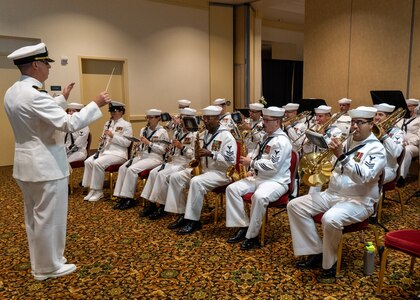 NAVAL STATION NORFOLK (Sept. 12, 2025) – The U.S. Navy Fleet Forces band perform during the Commander, Navy Region Mid-Atlantic (CNRMA) change of command and retirement ceremony held at Vista Point onboard Naval Station Norfolk, Sept. 12. CNRMA, now commanded by Rear Adm. Stephen Barnett, is the regional coordinator for all shore-based naval personnel and shore activities in the Mid-Atlantic region, which encompasses 20 states, 13 installations, and numerous Navy reserve centers from Maine to Virginia and as far west as Illinois. (U.S. Navy photo by Mass Communication Specialist 1st Class Kirk T. Putnam)