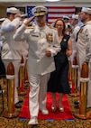 NAVAL STATION NORFOLK (Sept. 12, 2025) – Rear Adm. Carl Lahti and his family pass through the sideboys for the final time during a change of command and retirement ceremony held at Vista Point onboard Naval Station Norfolk, Sept. 12. CNRMA, now commanded by Rear Adm. Stephen Barnett, is the regional coordinator for all shore-based naval personnel and shore activities in the Mid-Atlantic region, which encompasses 20 states, 13 installations, and numerous Navy reserve centers from Maine to Virginia and as far west as Illinois. (U.S. Navy photo by Mass Communication Specialist 1st Class Kirk T. Putnam)