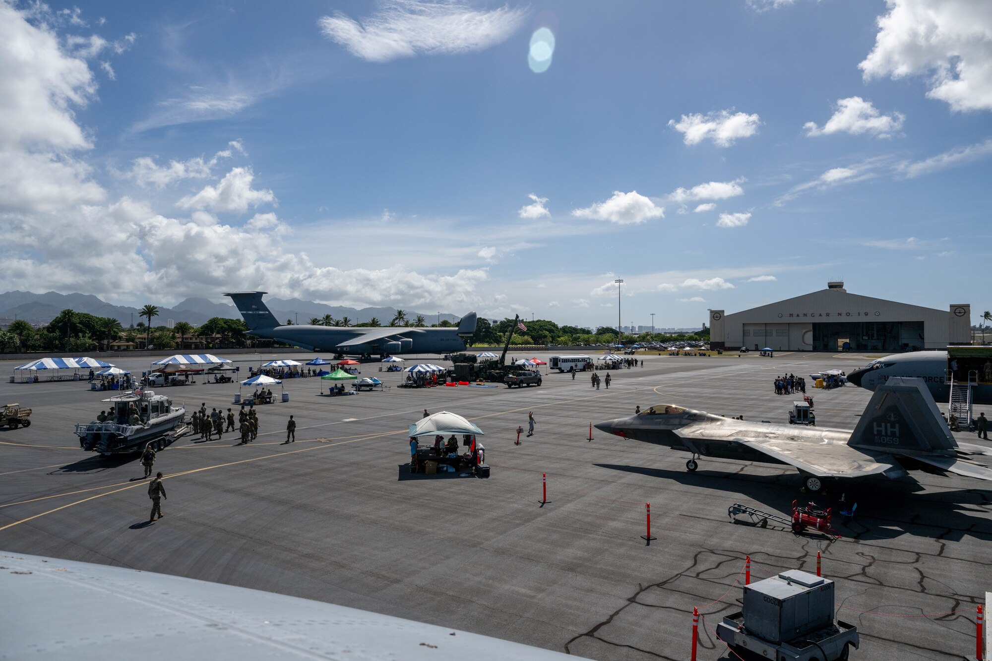 Students from across Oahu explore the flightline of Joint Base Pearl Harbor-Hickam during the Wings of Aloha Student Expo.