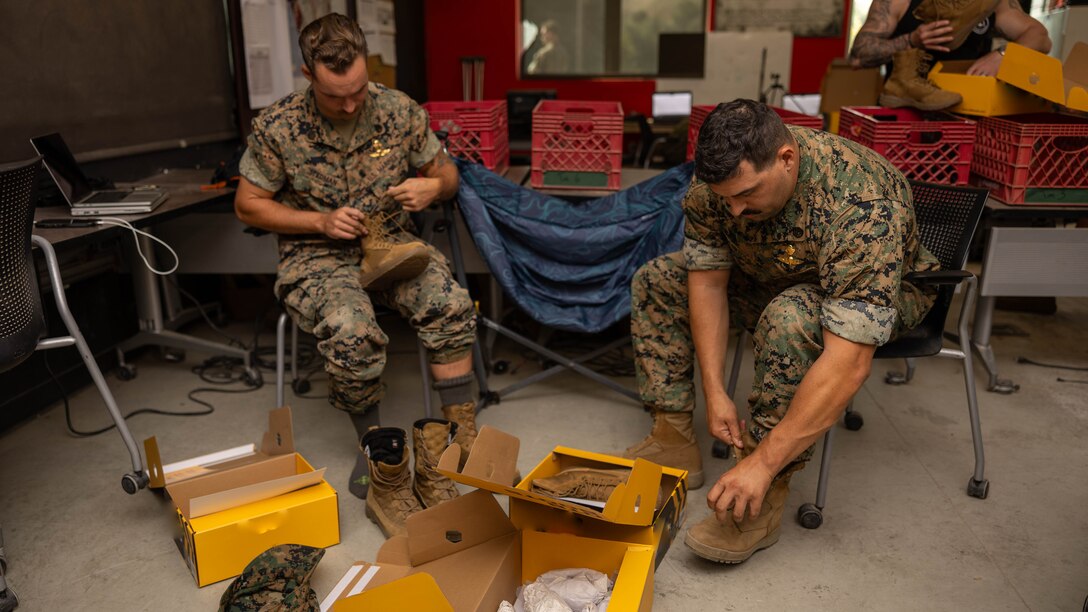 Marines unpack boots as part of the Optional Boot Program