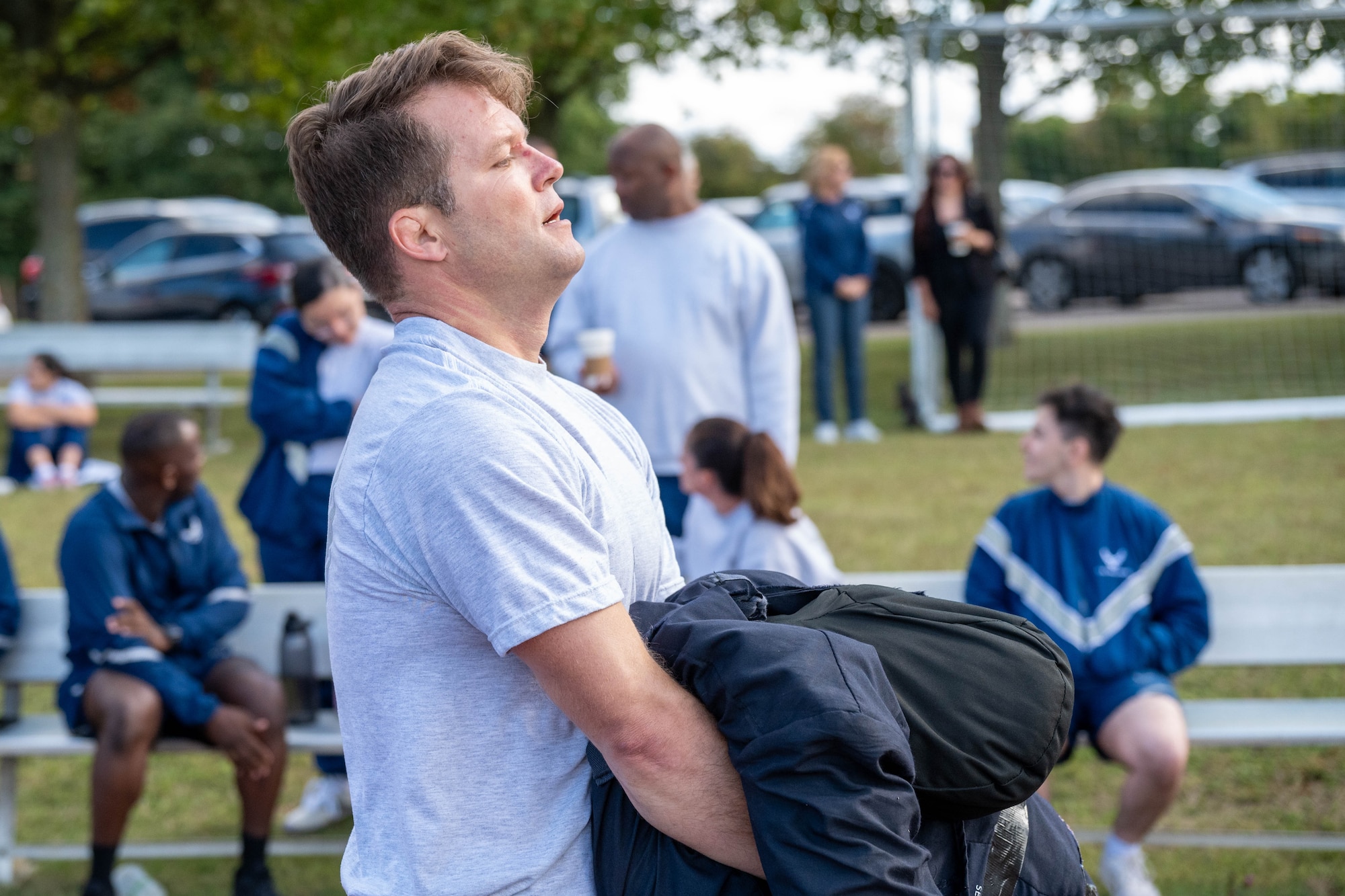 An Airman drags a dummy