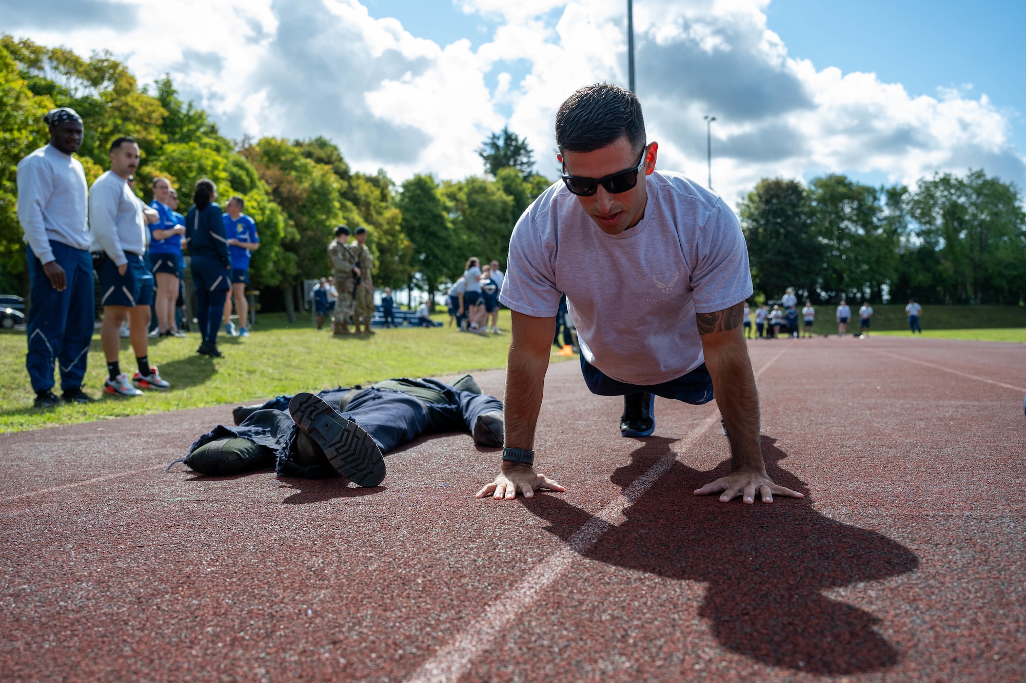 An Airman performs push-ups during a combat fitness challenge