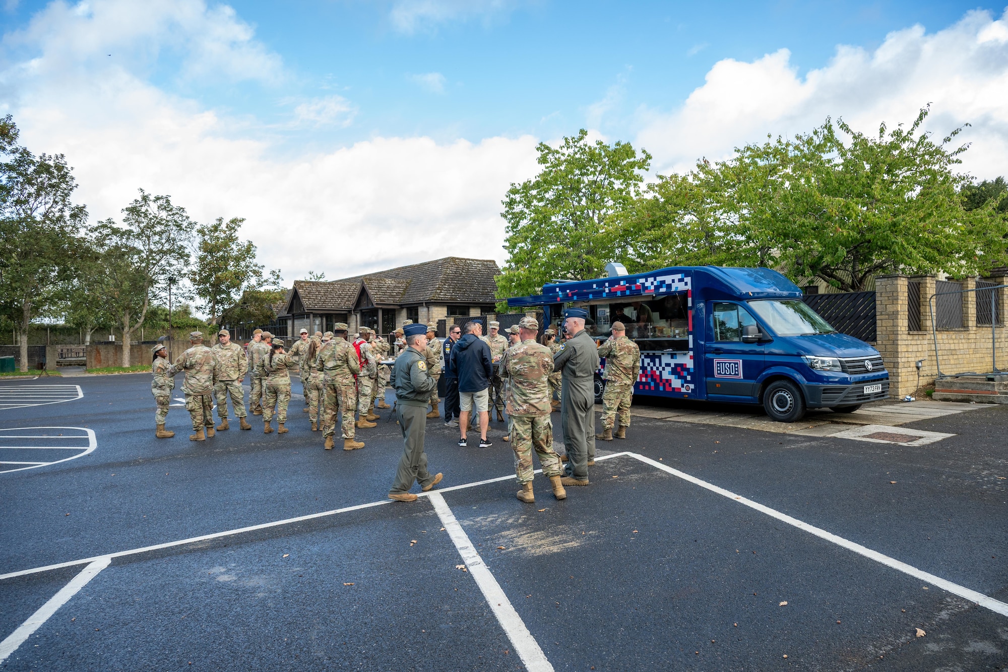 Pathfinders gather outside the USO “Big Ben” food truck