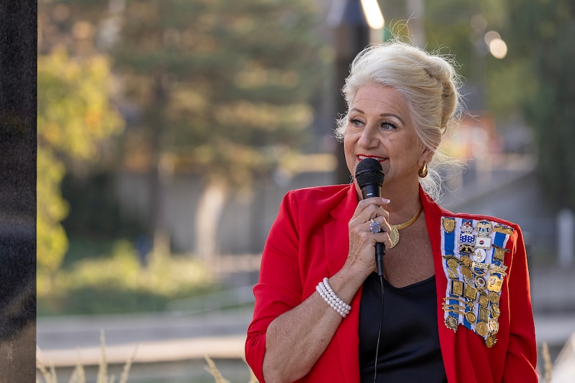 Jill Fewell, Daughters of the American Revolution Caroline Scott Harrison Chapter regent, delivers remarks during a commemoration ceremony at the Indiana 9/11 Memorial in Indianapolis Sept. 11, 2025. Soldiers and civilians from the U.S. Army Financial Management Command joined the DAR, the Indianapolis Fire Department’s Station 13, police officers from various agencies and members of the public to commemorate the 24th anniversary of the terrorist attacks on Sept. 11, 2001. (U.S. Army photo by Mark R. W. Orders-Woempner)