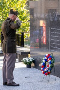 U.S. Army Col. Shaun D. McMurchie, 45th Finance Center director, lays a wreath during a commemoration ceremony at the Indiana 9/11 Memorial in Indianapolis Sept. 11, 2025. Soldiers and civilians from the U.S. Army Financial Management Command joined the Daughters of the American Revolution Caroline Scott Harrison Chapter, the Indianapolis Fire Department’s Station 13, police officers from various agencies and members of the public to commemorate the 24th anniversary of the terrorist attacks on Sept. 11, 2001. (U.S. Army photo by Mark R. W. Orders-Woempner)