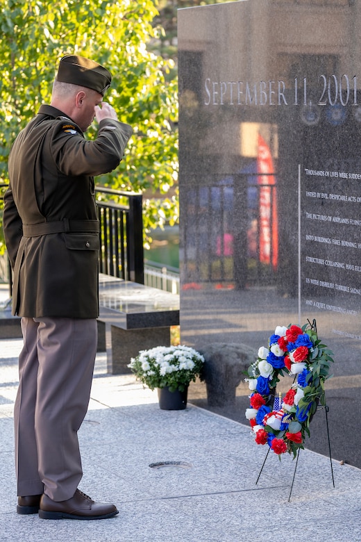 U.S. Army Col. Shaun D. McMurchie, 45th Finance Center director, lays a wreath during a commemoration ceremony at the Indiana 9/11 Memorial in Indianapolis Sept. 11, 2025. Soldiers and civilians from the U.S. Army Financial Management Command joined the Daughters of the American Revolution Caroline Scott Harrison Chapter, the Indianapolis Fire Department’s Station 13, police officers from various agencies and members of the public to commemorate the 24th anniversary of the terrorist attacks on Sept. 11, 2001. (U.S. Army photo by Mark R. W. Orders-Woempner)