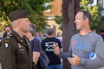 U.S. Army Col. Shaun D. McMurchie, 45th Finance Center director, talks with a member of the public during a commemoration ceremony at the Indiana 9/11 Memorial in Indianapolis Sept. 11, 2025. Soldiers and civilians from the U.S. Army Financial Management Command joined the Daughters of the American Revolution Caroline Scott Harrison Chapter, the Indianapolis Fire Department’s Station 13, police officers from various agencies and members of the public to commemorate the 24th anniversary of the terrorist attacks on Sept. 11, 2001. (U.S. Army photo by Mark R. W. Orders-Woempner)