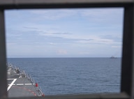 The Arleigh Burke-class guided-missile destroyer USS John Finn (DDG 113) takes station with the Jose Rizal-class frigate BRP Jose Rizal (FF-150) during Resolute Dragon 25 in the South China Sea, Sept. 12.