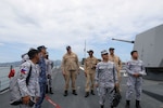 SUBIC BAY, Philippines (Sep. 11, 2025)—Sailors aboard the Arleigh Burke-class guided-missile destroyer USS John Finn (DDG 113) teach Sailors from the Philippine Navy and Cmdr. Noriyuki Kawahata, Assistant Defense Attaché of Japan to the Philippines, about flight operations on the fo’c’sle during a subject matter exchange as part of multi-lateral Maritime Cooperative Activity in Subic Bay, Philippines, Sep. 11. John Finn is forward-deployed and assigned to Destroyer Squadron (DESRON) 15, the Navy’s largest DESRON and the U.S. 7th Fleet’s principal surface force. (U.S. Navy photo by Mass Communication Specialist 2nd Class Alexandria Esteban)